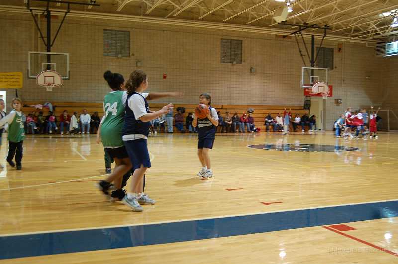 Chace Basketball 2-10 0030.JPG - Looks like they're setting up a wall for Ellen.